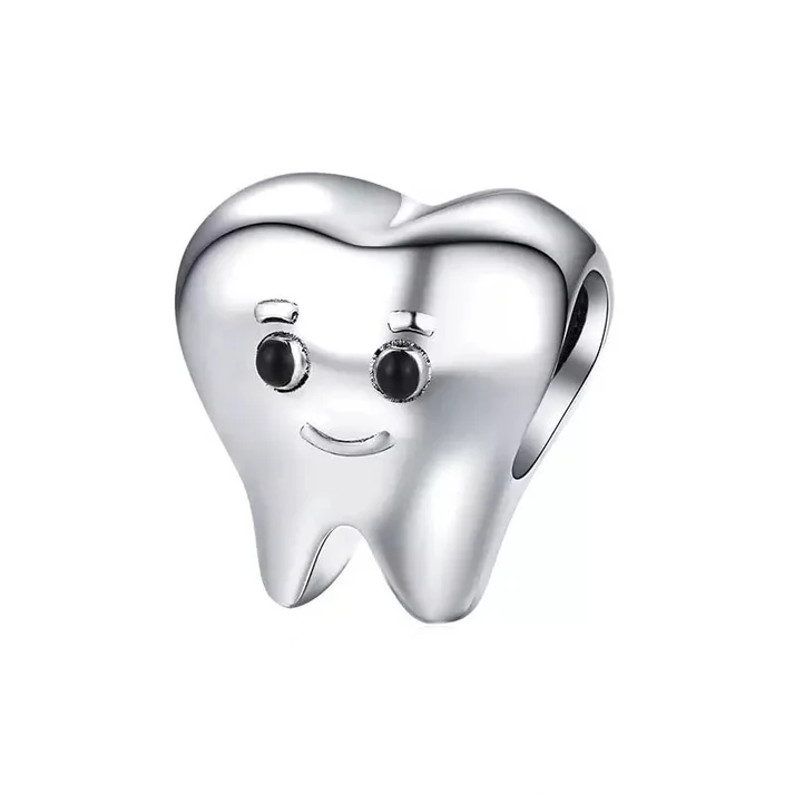 Momento privjesak - Prvi zubić